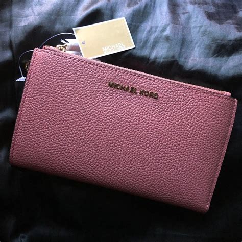 dark purple michael kors wallet|michael kors pink wristlet wallet.